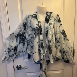 Sheer white and navy blue tye dye wrap with tie in front and 3/4 sleeves